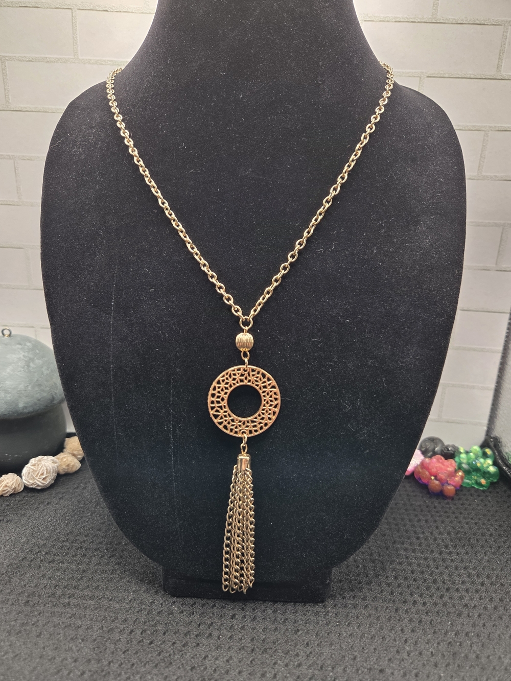 1269. Gold-Tone Filigree Circle Tassel Necklace